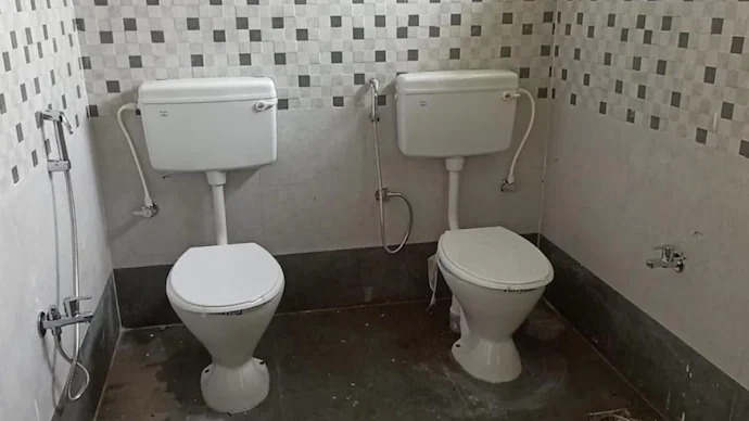 wo commodes in one bathroom